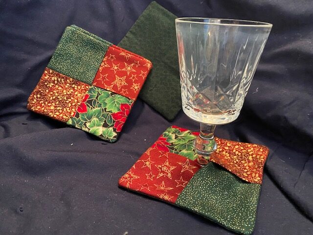 Holiday fabric coasters with wine glass