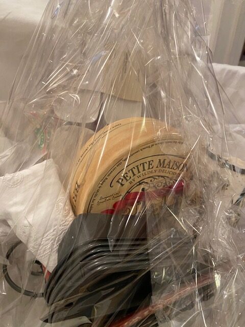 gift basket wrapped in cellophane